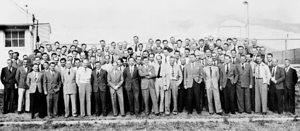 Kurt H. Debus, a former V-2 rocket scientist who became a NASA director, sitting between U.S. President John F. Kennedy and U.S. Vice President Lyndon B. Johnson in 1962 at a briefing at Blockhouse 34, Cape Canaveral Missile Test Annex